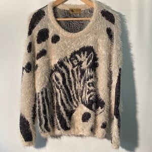 Chic Black and Cream Animal Print Sweater